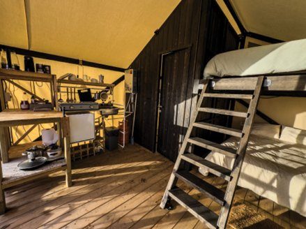 Beds and ladder inside the Safari tent