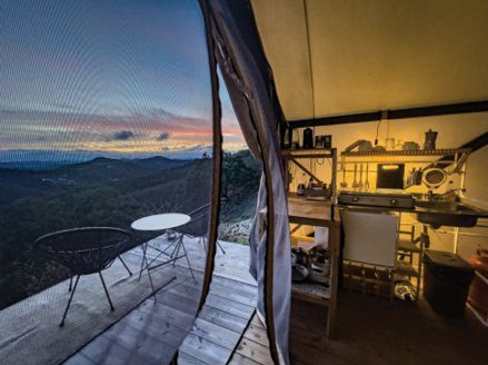 The kitchenette at dusk, with the valley beyond